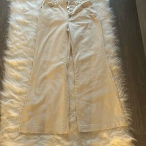 Cream colored wide legged pantsed jeans size 29